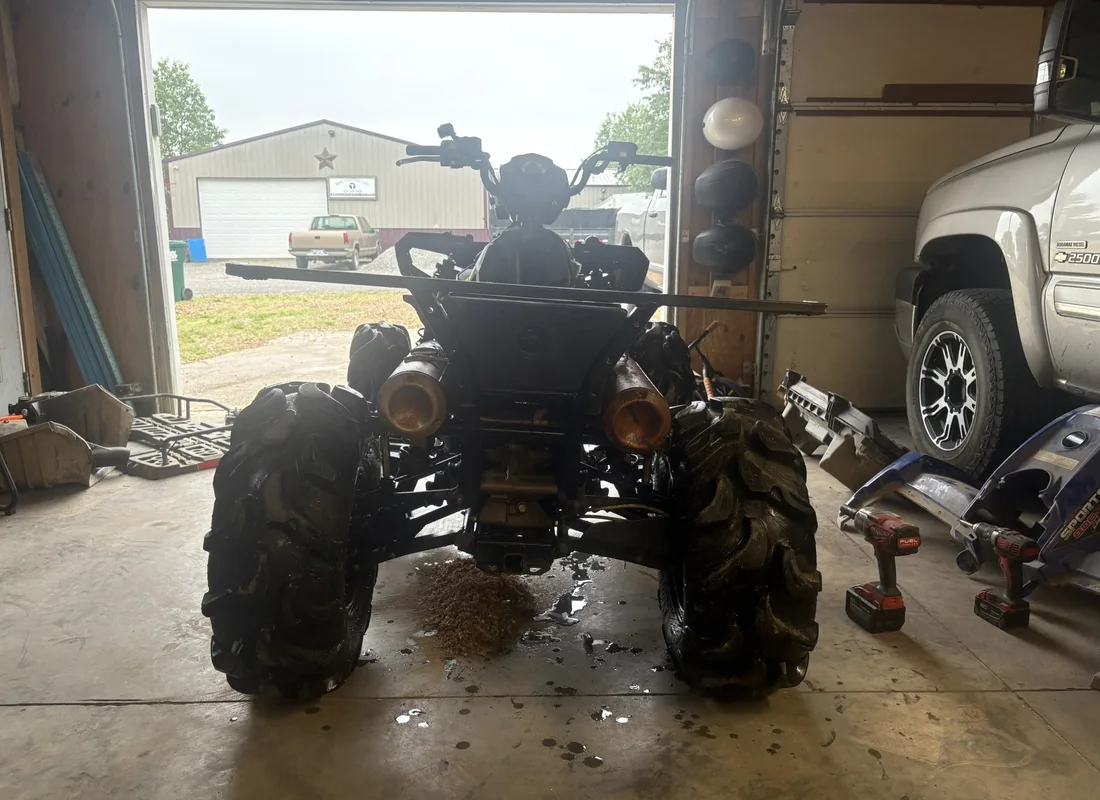 ATV undergoing repair in the shop